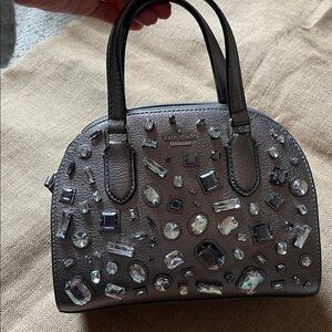 Kate Spade Metallic leather purse.